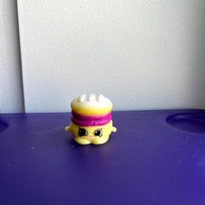 Mel T Moment is a common Bakery Shopkin from Season Five.